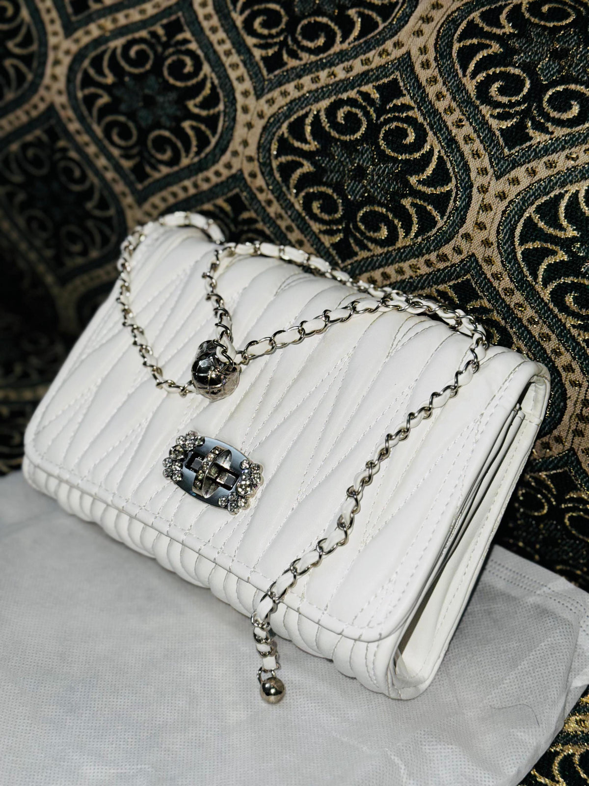 Lace & Luxe leather quilted mini crossbody bag with chain strap, featuring a stylish shoulder purse design.