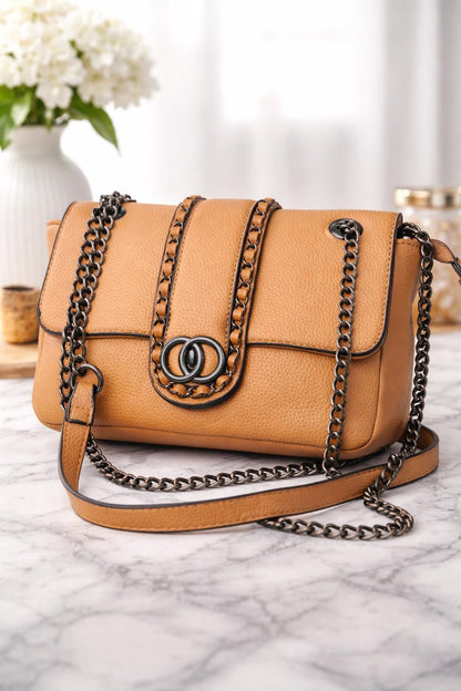 Lace & Luxe leather chain shoulder bag with woven chain trim and flap crossbody design, stylish and compact for everyday use.