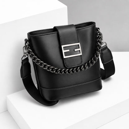 Genuine leather shoulder bag with chain detail from Lace & Luxe, featuring a chic crossbody and bucket design.
