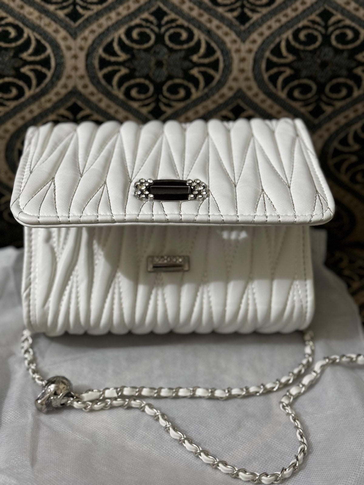 Lace & Luxe leather mini quilted chain crossbody and shoulder purse with gold-tone hardware and compact design.