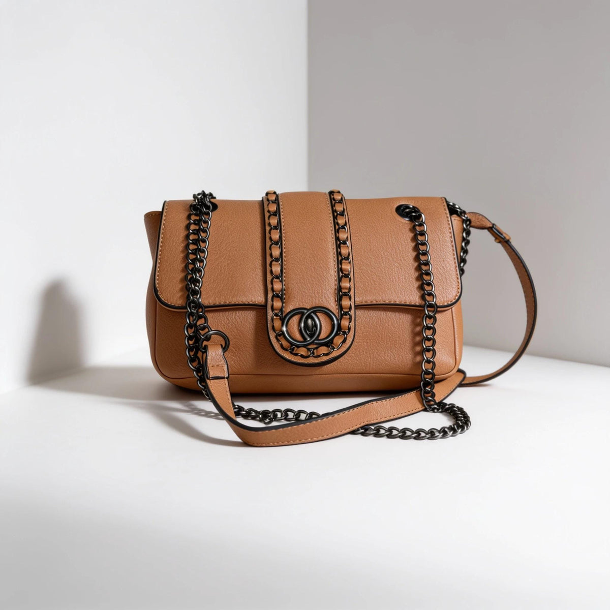 Lace & Luxe leather chain shoulder bag with woven chain trim and flap crossbody design, stylish and versatile accessory.