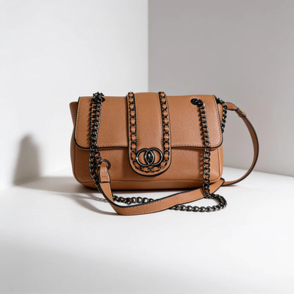 Lace & Luxe leather chain shoulder bag with woven chain trim and flap crossbody design, stylish and versatile accessory.