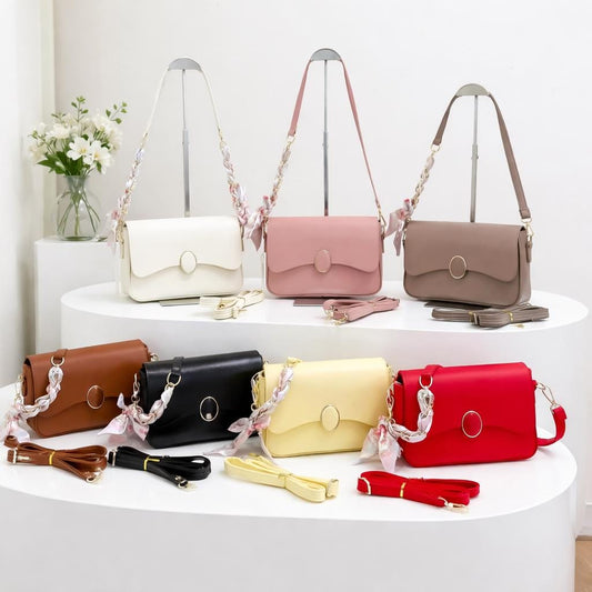 Lace & Luxe minimal leather crossbody bag with adjustable strap, small shoulder purse for everyday essentials, in neutral tones.