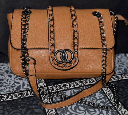 Lace & Luxe leather chain shoulder bag with woven chain trim and flap crossbody design, stylish and compact purse.