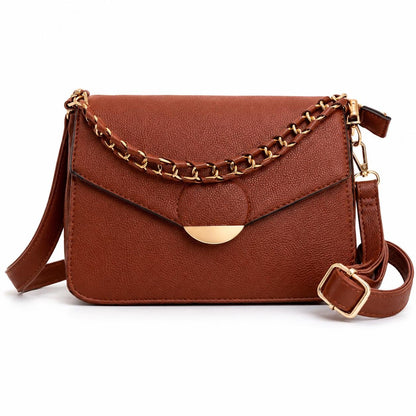 Leather crossbody bag with textured finish from Lace & Luxe, featuring a compact mini shoulder purse design and adjustable strap.