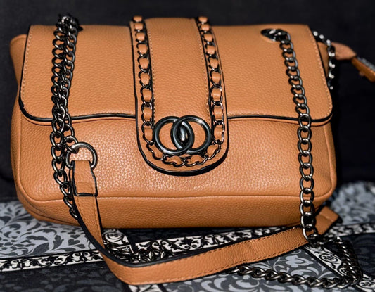 Lace & Luxe leather chain shoulder bag with woven chain trim and flap crossbody design, stylish and compact purse.