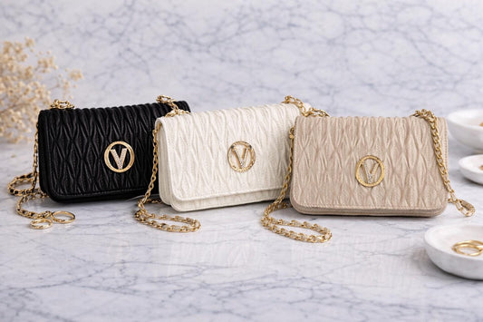 Lace & Luxe quilted gold chain crossbody bag with elegant mini clutch design, suitable for evening and formal occasions.