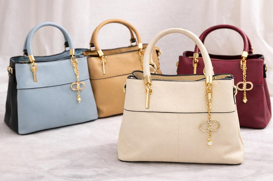 Lace & Luxe faux leather top handle bag with gold charm, crossbody strap, and elegant design for women.