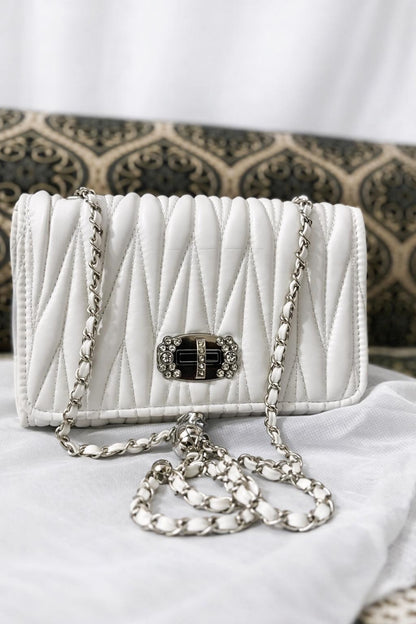Lace & Luxe leather mini bag with quilted design, chain strap, crossbody and shoulder purse, compact and stylish.