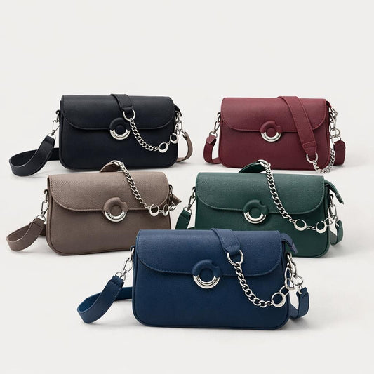 Lace & Luxe leather crossbody bag with chain strap, stylish shoulder purse for everyday use, featuring a sleek design and compact size.