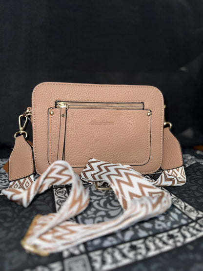 Lace & Luxe small crossbody handbag with adjustable chevron strap, stylish fashion bag for women, made of sleek black material.