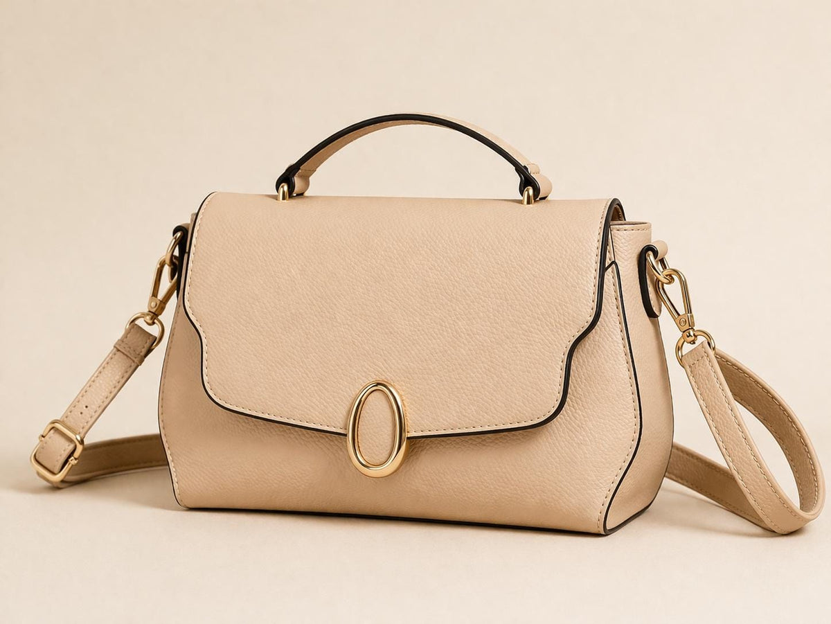Lace & Luxe leather crossbody bag with multiple compartments, adjustable strap, and minimalist design, shown with the bag on a plain background.